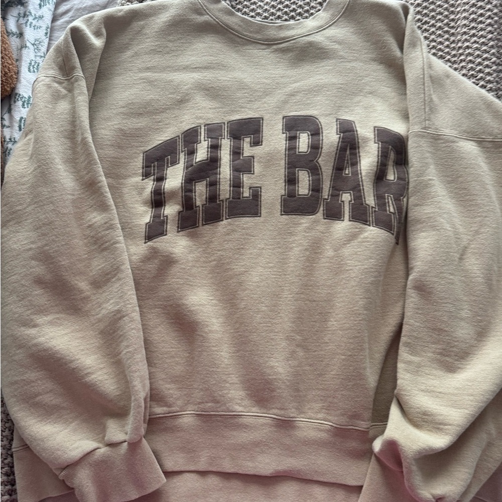 The Bar Crewneck Sweatshirt in Light Olive with Dark Brown Logo